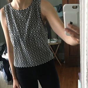 Black and white sleeveless top with pattern